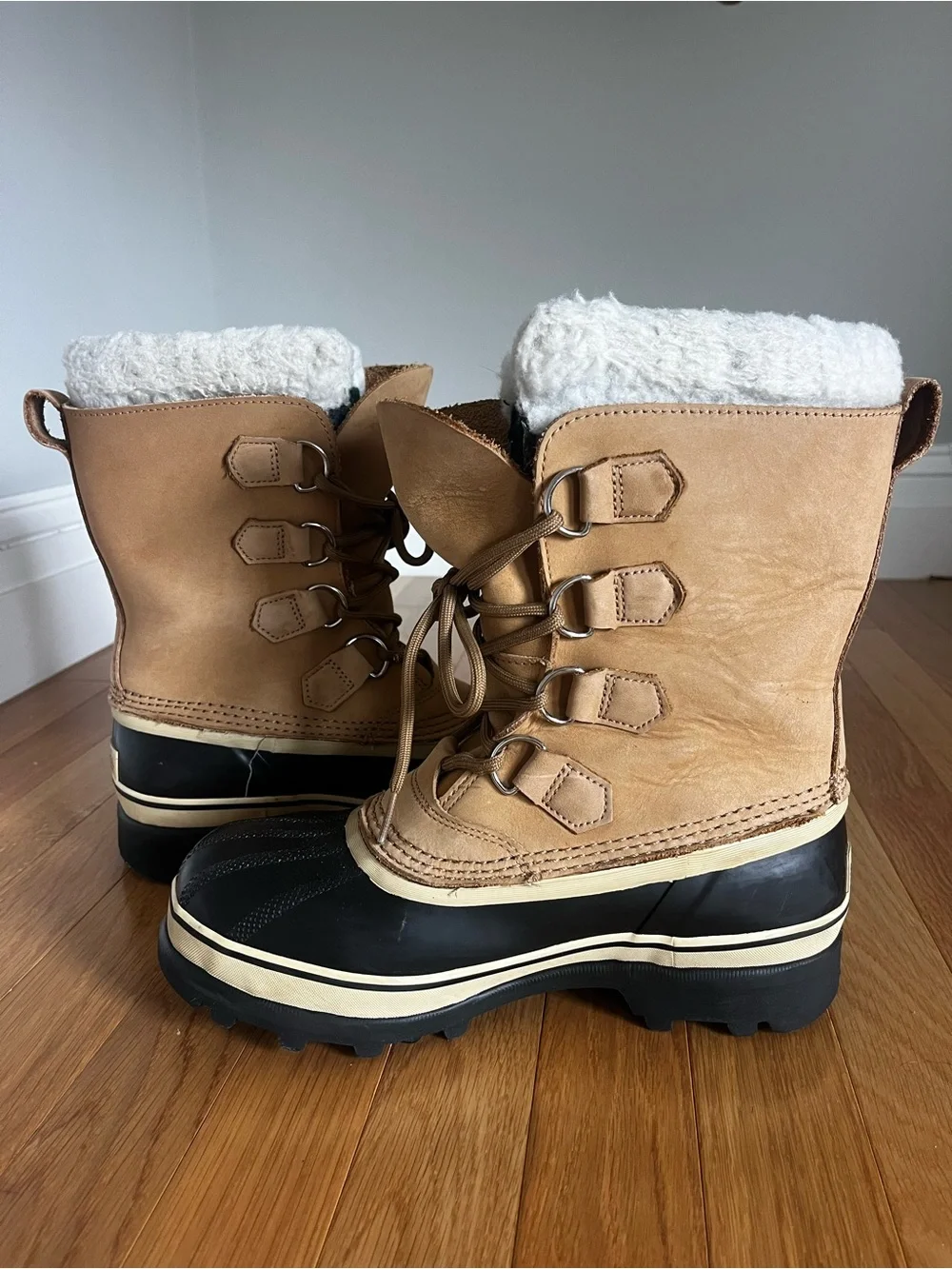 Sorel Tan and Black Caribou Winter Boots
